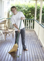 Tenn sweeping the porch