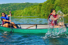 Photo of kids in kayak