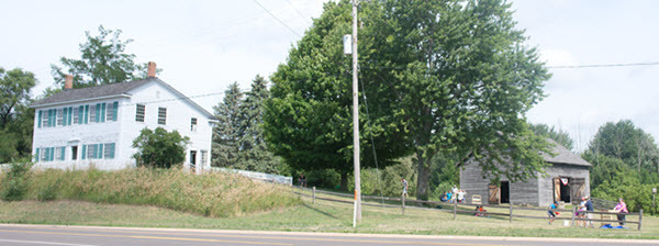 Walker Tavern and the barn as viewed from US12
