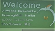PROP welcome sign in eight languages
