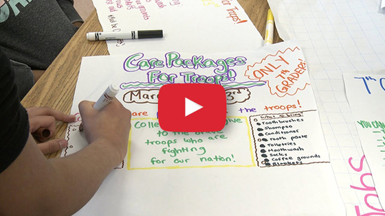 Student making a poster