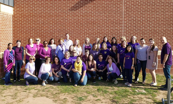Laurel Hill ES staff wearing purple for Month of the Military Child
