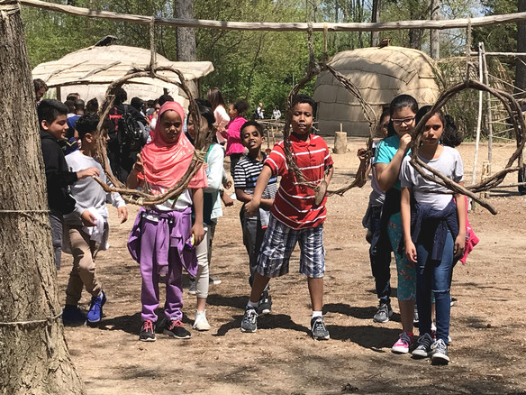 Photo of students playing a game at Jamestown field trip