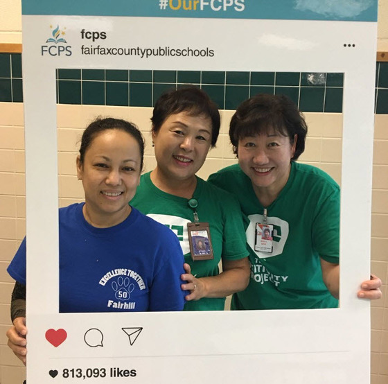 Fairhill ES cafeteria staff with #OurFCPS frame