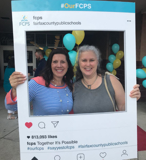 Bailey's Upper ES Principal Marie Lemmon and Special Education Teacher Leona Hyatt with #OurFCPS frame.