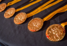 Photo of medals symbolizing Spirit of Community Awards